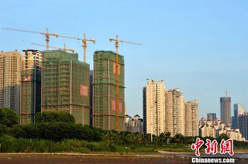 資料圖：正在建設(shè)中的房地產(chǎn)樓盤(pán)。<a target='_blank' href='http://www.chinanews.com/'>中新社</a>記者 張斌 攝