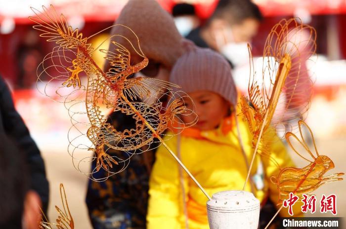 北京消費季“2023——年花豐食大集”正月初一在北京世界花卉大觀園開市。　<a target='_blank' href='/'>中新社</a>記者 富田 攝