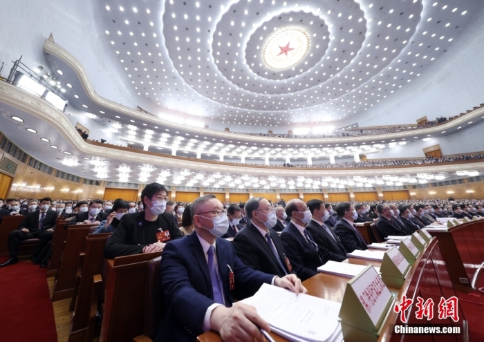 3月7日，十四屆全國人大一次會議在北京人民大會堂舉行第二次全體會議。<a target='_blank' href='/'>中新社</a>記者 盛佳鵬 攝